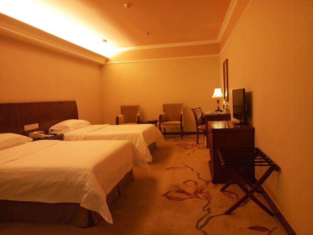 Vienna Hotel Pekín Habitación foto