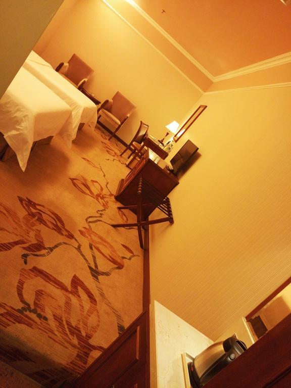 Vienna Hotel Pekín Habitación foto