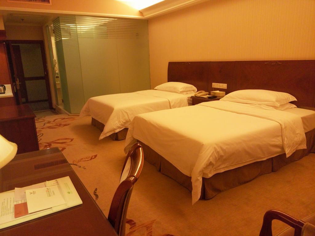 Vienna Hotel Pekín Habitación foto