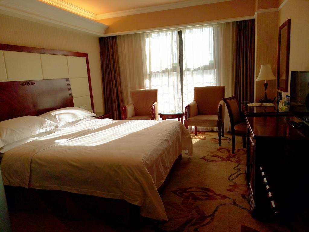 Vienna Hotel Pekín Habitación foto