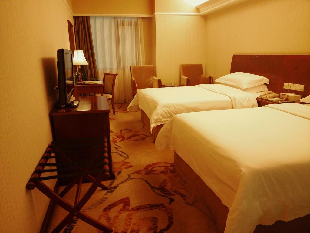 Vienna Hotel Pekín Habitación foto
